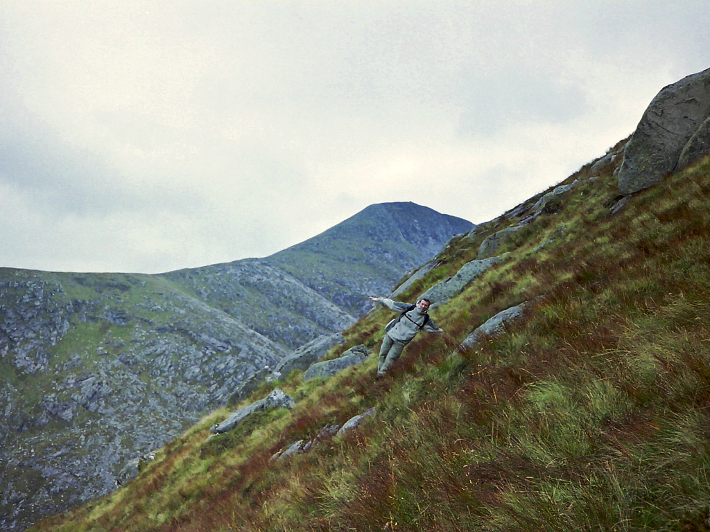 Traversing Meall Tarsuin with an Albannaich in background